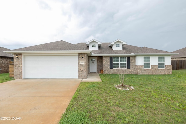 2006 Eagle Dr, Neosho, MO 64850 - view of front of house featuring brick siding, concrete driveway, and a garage