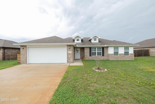 2006 Eagle Dr, Neosho, MO 64850 - view of front facade featuring brick siding, an attached garage, concrete driveway, and roof with shingles