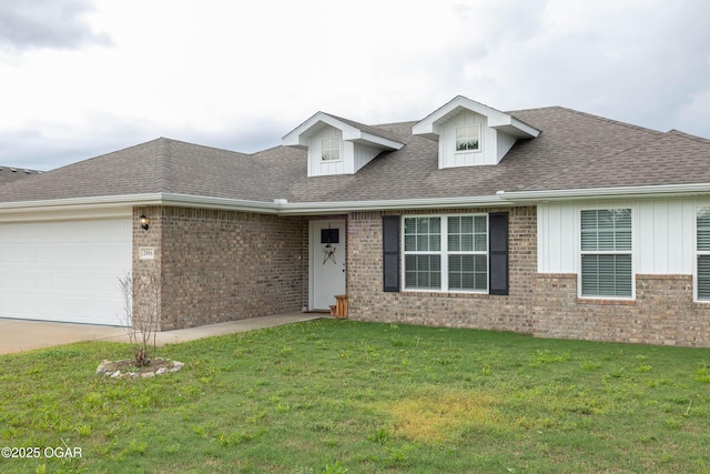 2006 Eagle Dr, Neosho, MO 64850 - view of front of house with a front lawn, an attached garage, board and batten siding, a shingled roof, and concrete driveway