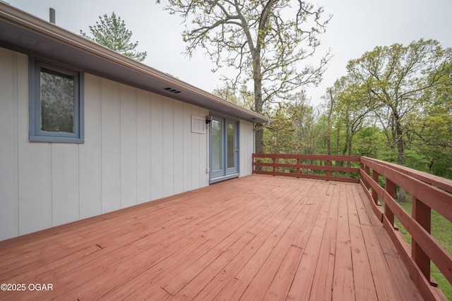 wooden deck with visible vents