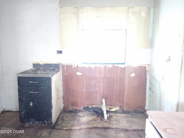 miscellaneous room with wood finished floors