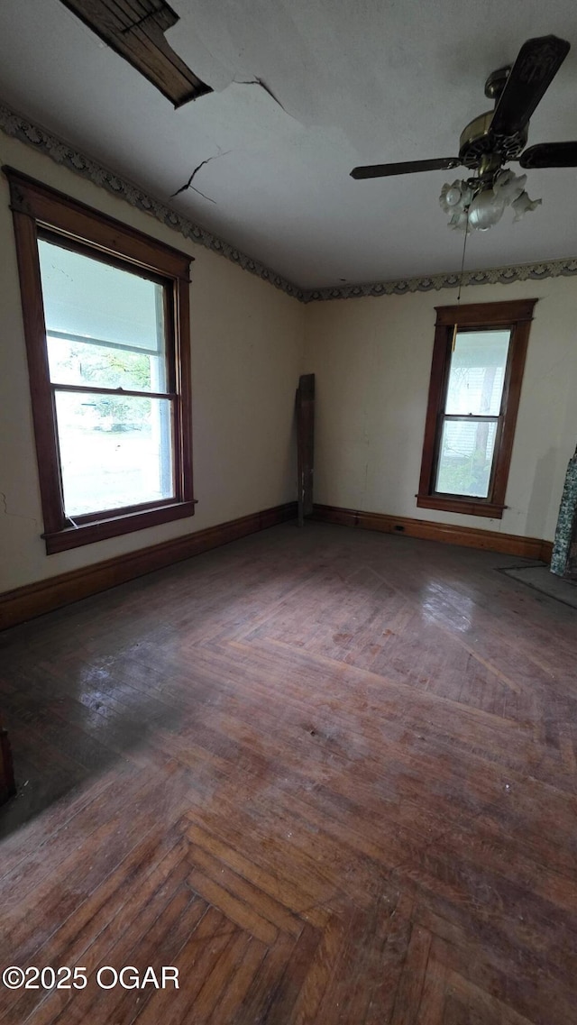 114 S Pennsylvania St, Webb City, MO 64870 - spare room featuring baseboards and a ceiling fan