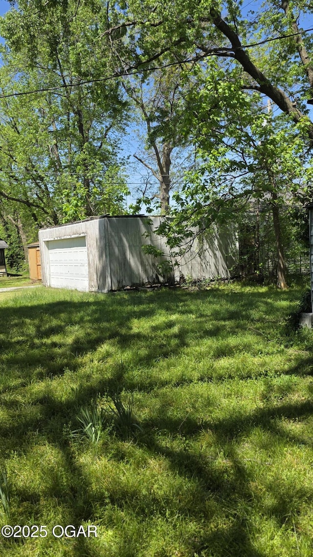 114 S Pennsylvania St, Webb City, MO 64870 - view of yard with an outbuilding and a detached garage