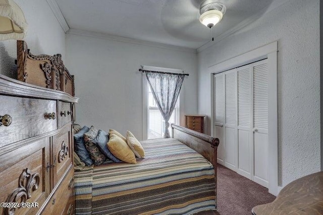 1418 Cleveland Ave, Baxter Springs, KS 66713 - bedroom with carpet flooring, ornamental molding, ceiling fan, a closet, and a textured wall