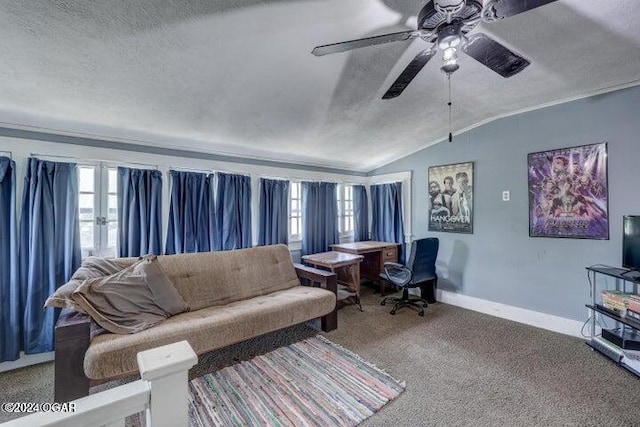 1418 Cleveland Ave, Baxter Springs, KS 66713 - carpeted living area featuring vaulted ceiling, baseboards, ceiling fan, a textured ceiling, and an office area