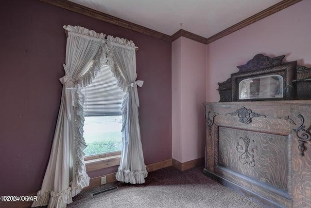 1418 Cleveland Ave, Baxter Springs, KS 66713 - unfurnished bedroom with carpet floors, ornamental molding, and baseboards