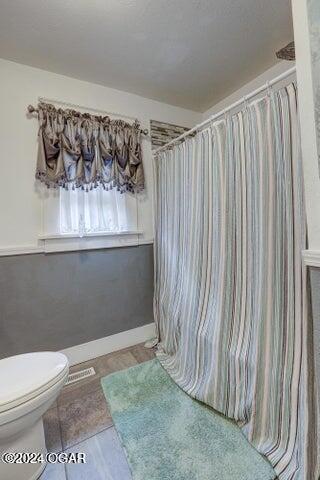 1418 Cleveland Ave, Baxter Springs, KS 66713 - bathroom with toilet