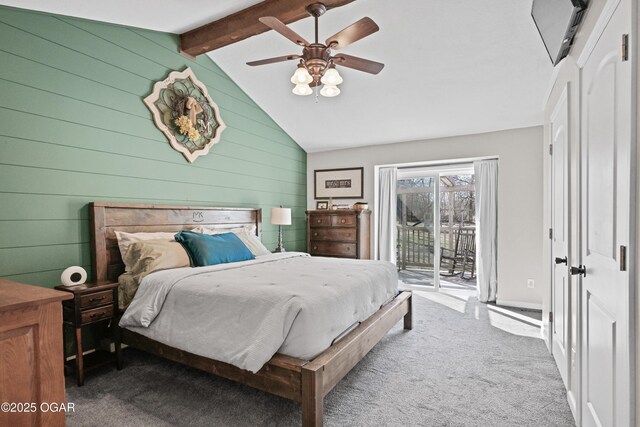 400 Silverwood Ln, Joplin, MO 64801 - carpeted bedroom with access to outside, wood walls, and a ceiling fan