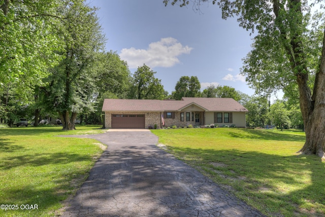 400 Silverwood Ln, Joplin, MO 64801 - view of front of house with a garage, asphalt driveway, and a front yard