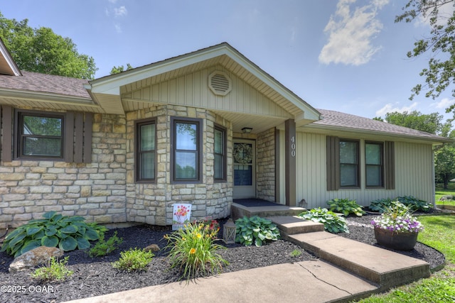 400 Silverwood Ln, Joplin, MO 64801 - view of front of house featuring stone siding and roof with shingles