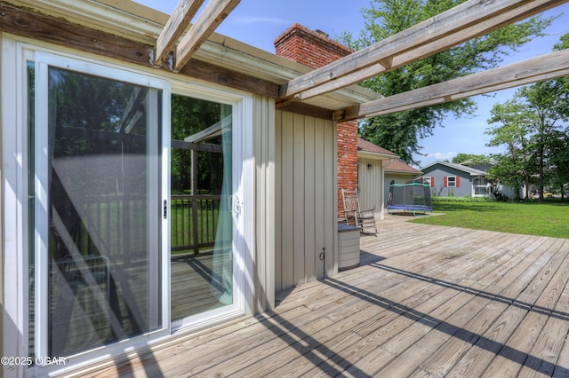 400 Silverwood Ln, Joplin, MO 64801 - wooden terrace with a trampoline and a yard