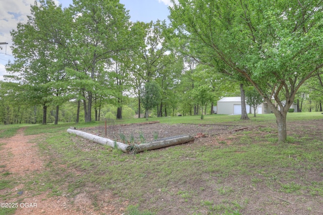 4537 Dolphin Dr, Joplin, MO 64804 - view of yard with an outdoor structure