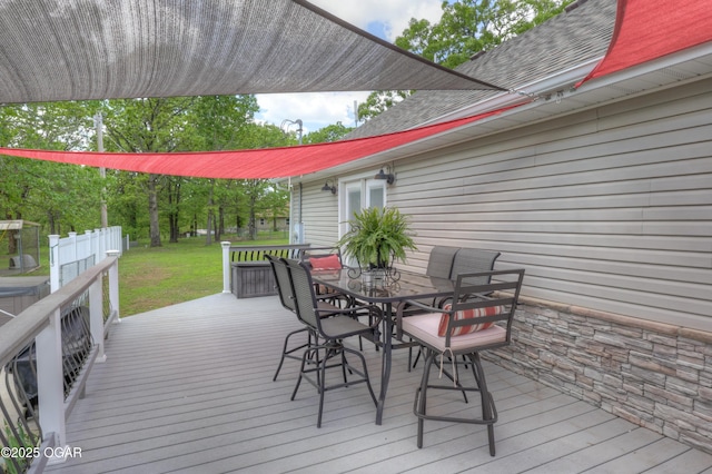 4537 Dolphin Dr, Joplin, MO 64804 - wooden terrace with a lawn and outdoor dining space