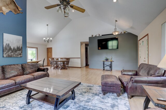 4537 Dolphin Dr, Joplin, MO 64804 - living area with recessed lighting, ceiling fan with notable chandelier, high vaulted ceiling, and wood finished floors