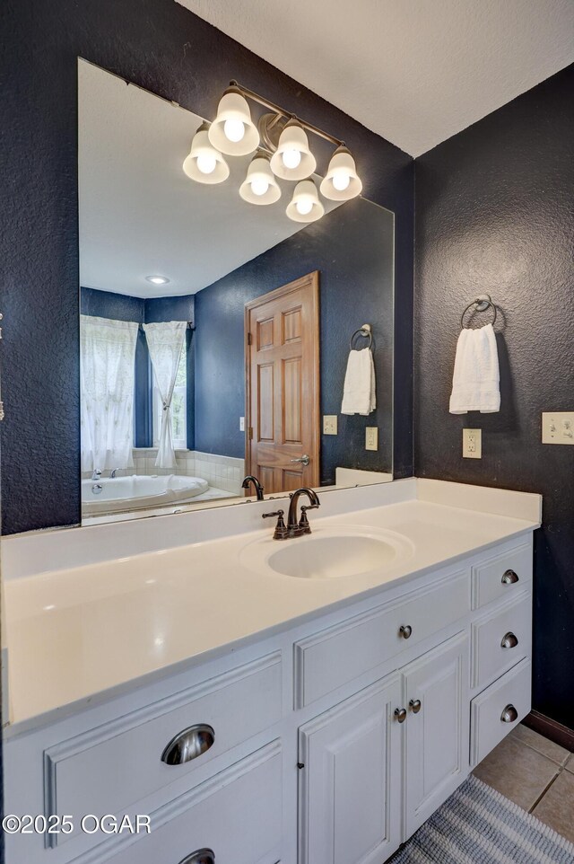 4537 Dolphin Dr, Joplin, MO 64804 - full bathroom featuring a tub, tile patterned flooring, vanity, and a textured wall