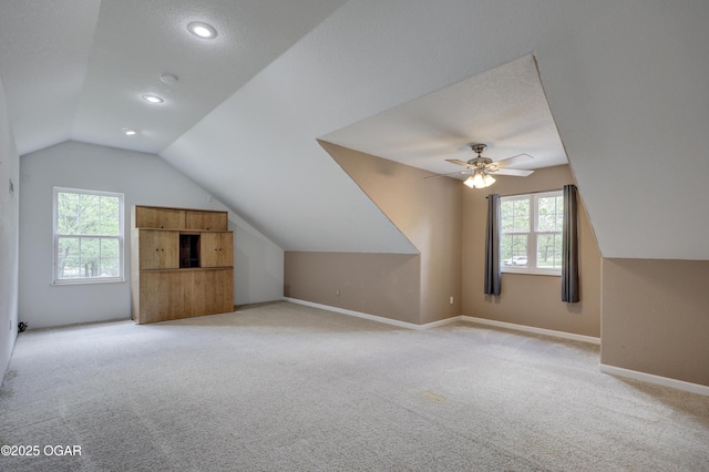 4537 Dolphin Dr, Joplin, MO 64804 - bonus room featuring light colored carpet, vaulted ceiling, ceiling fan, and a healthy amount of sunlight