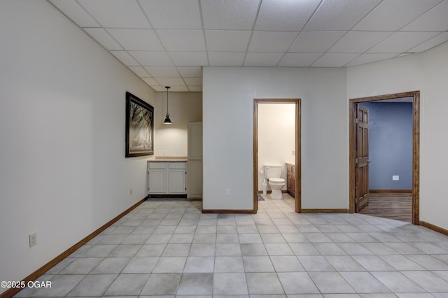 4537 Dolphin Dr, Joplin, MO 64804 - interior space featuring baseboards and a drop ceiling