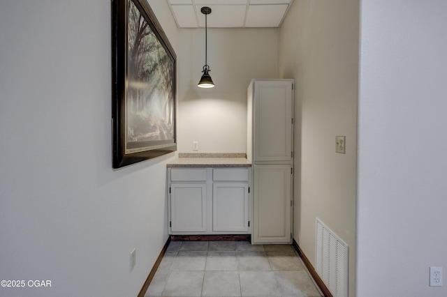 4537 Dolphin Dr, Joplin, MO 64804 - interior space featuring baseboards, light tile patterned floors, and visible vents