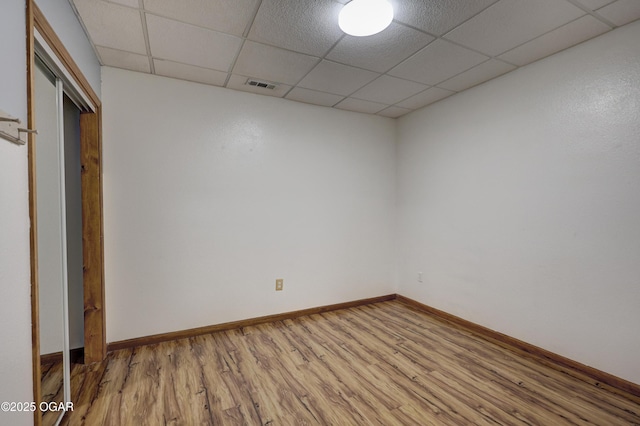 4537 Dolphin Dr, Joplin, MO 64804 - unfurnished room featuring a paneled ceiling, baseboards, light wood-style flooring, and visible vents