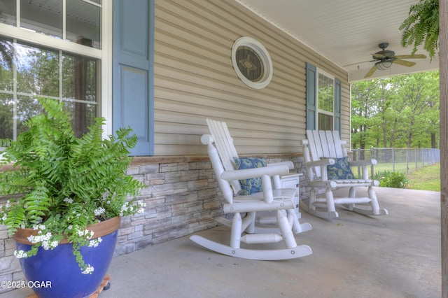 4537 Dolphin Dr, Joplin, MO 64804 - view of patio / terrace with covered porch, fence, and ceiling fan