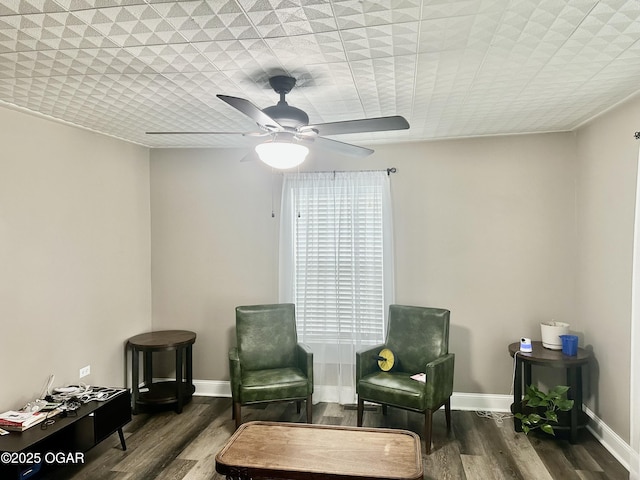 212 N Jefferson St, Webb City, MO 64870 - sitting room featuring a ceiling fan, wood finished floors, and baseboards
