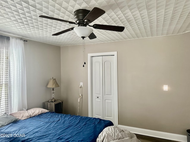 212 N Jefferson St, Webb City, MO 64870 - bedroom featuring a closet and a ceiling fan