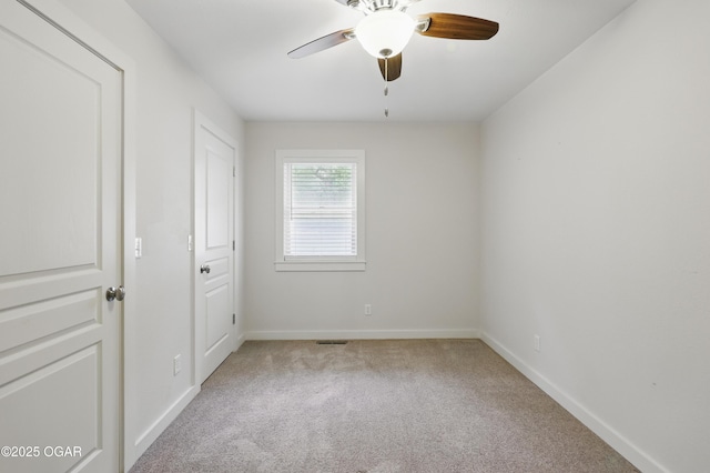 1214 Bramar Dr, Joplin, MO 64804 - unfurnished bedroom featuring carpet, baseboards, and ceiling fan