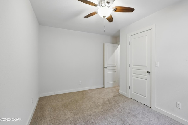 1214 Bramar Dr, Joplin, MO 64804 - unfurnished bedroom with carpet floors, baseboards, and ceiling fan