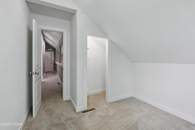 1214 Bramar Dr, Joplin, MO 64804 - bonus room featuring lofted ceiling, carpet, and baseboards