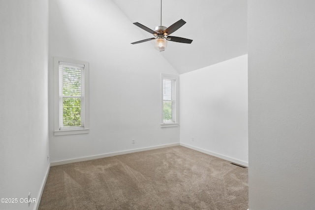 1214 Bramar Dr, Joplin, MO 64804 - carpeted empty room featuring healthy amount of natural light, ceiling fan, baseboards, and high vaulted ceiling