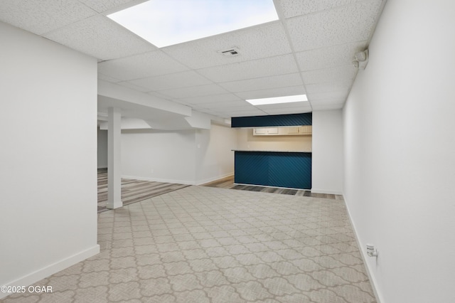 1214 Bramar Dr, Joplin, MO 64804 - finished basement with a paneled ceiling and baseboards