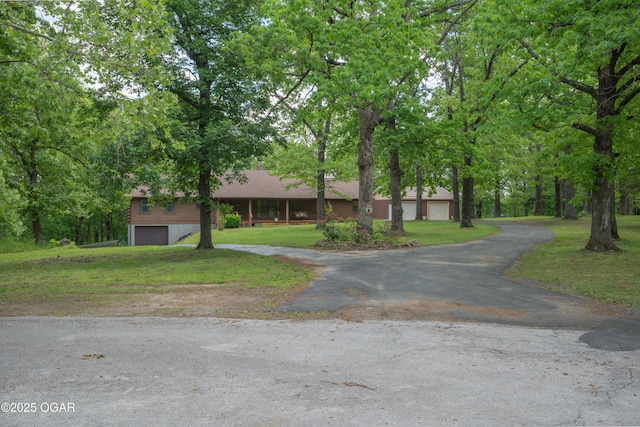 6309 Impala Dr, Joplin, MO 64804 - single story home featuring a front yard, driveway, and a garage