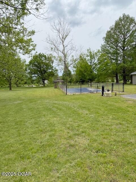 view of yard featuring fence