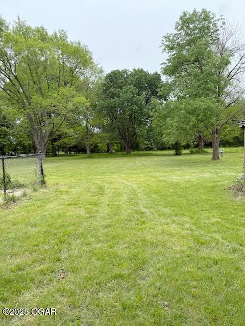 view of yard with fence