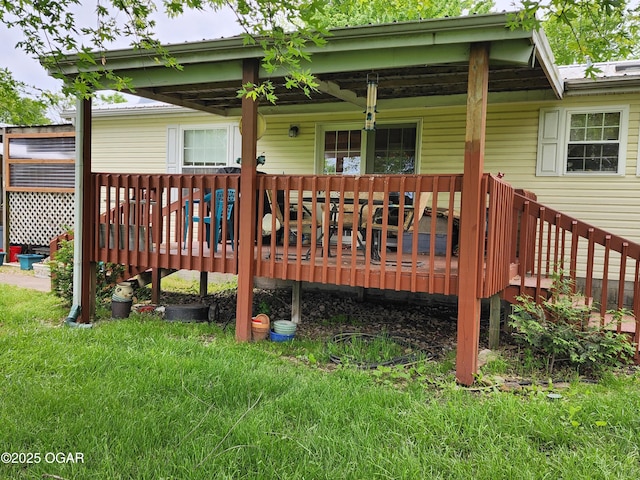 deck featuring a yard