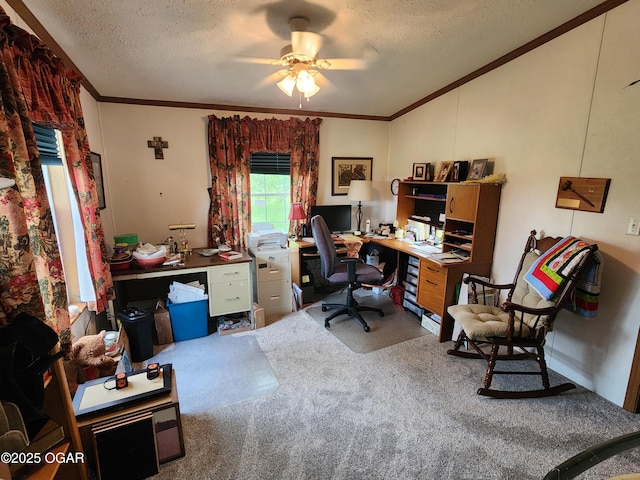 carpeted office space featuring ornamental molding, a textured ceiling, vaulted ceiling, and ceiling fan