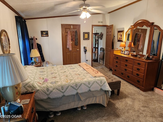 carpeted bedroom featuring crown molding and ceiling fan