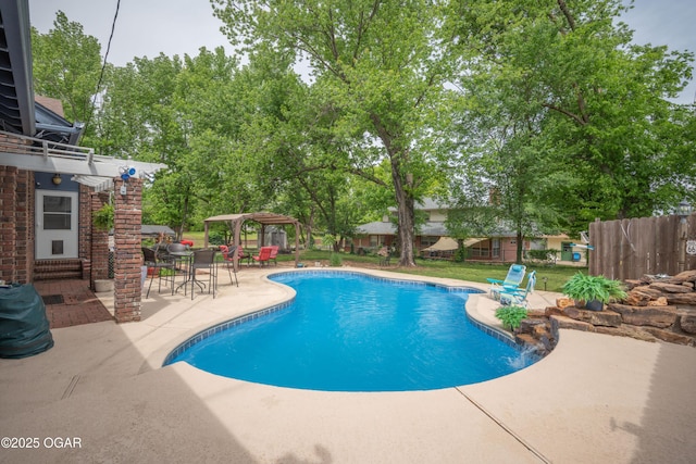 view of pool featuring a patio, a gazebo, fence, and a pergola