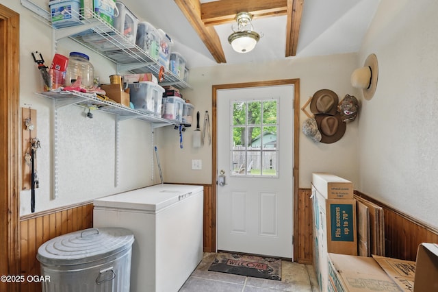 laundry room with wainscoting