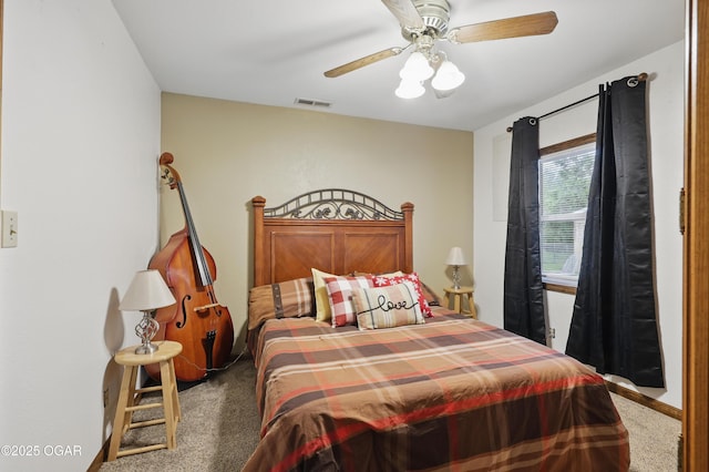 bedroom with carpet floors, ceiling fan, and baseboards