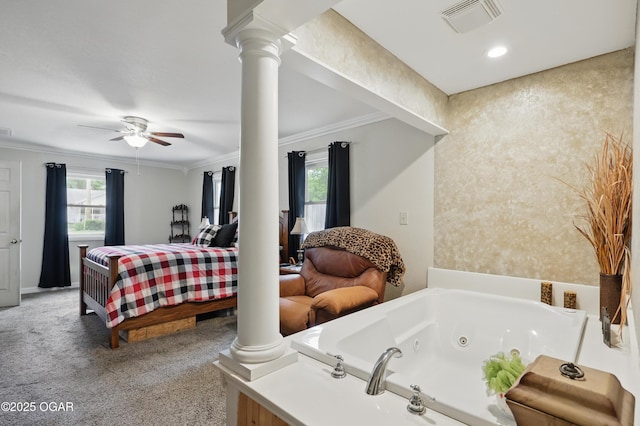 bathroom with connected bathroom, ornate columns, a ceiling fan, crown molding, and a tub with jets