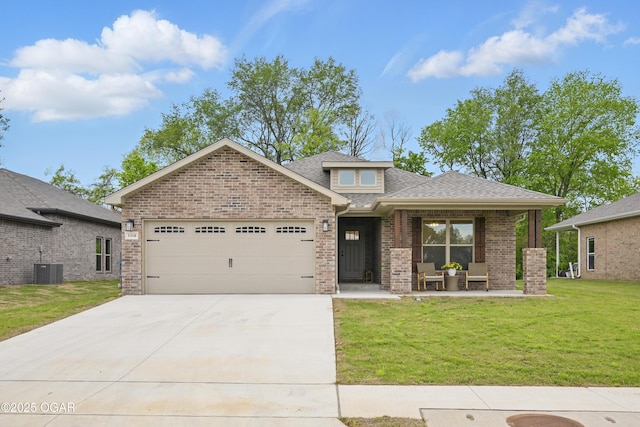 1318 Foundry Dr, Carthage, MO 64836 - view of front facade featuring a garage, concrete driveway, a front lawn, and brick siding