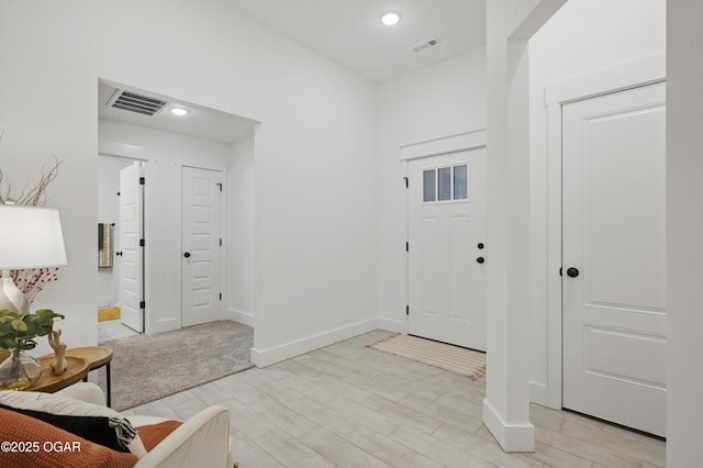 1318 Foundry Dr, Carthage, MO 64836 - foyer with light wood-style flooring, recessed lighting, and baseboards