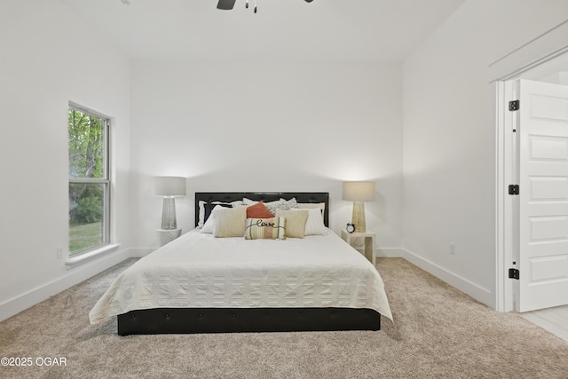 1318 Foundry Dr, Carthage, MO 64836 - carpeted bedroom with baseboards and a ceiling fan