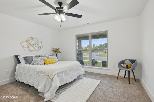 1318 Foundry Dr, Carthage, MO 64836 - carpeted bedroom featuring baseboards and a ceiling fan