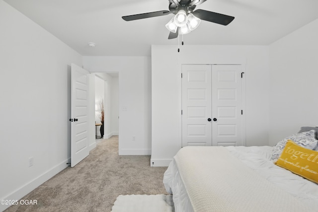 1318 Foundry Dr, Carthage, MO 64836 - bedroom with light colored carpet, a closet, baseboards, and ceiling fan
