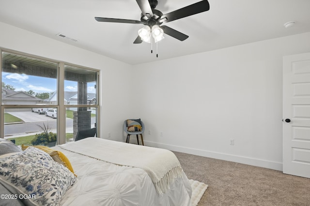 1318 Foundry Dr, Carthage, MO 64836 - carpeted bedroom featuring baseboards and ceiling fan