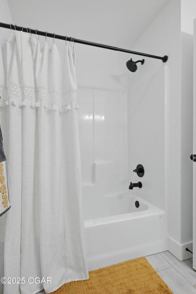 1318 Foundry Dr, Carthage, MO 64836 - bathroom featuring shower / bath combo and tile patterned flooring