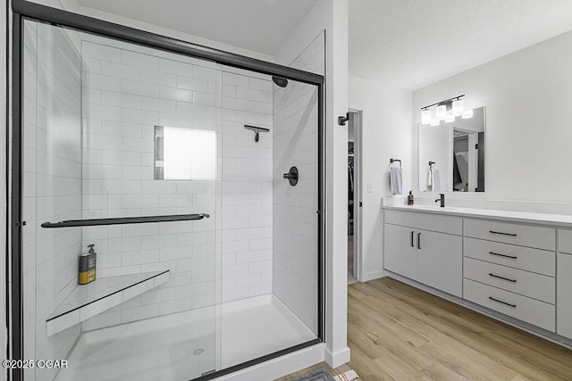 1528 N Edgemont Cir, Springfield, MO 65802 - full bath with a stall shower, wood finished floors, and vanity