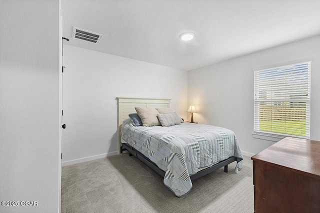 1528 N Edgemont Cir, Springfield, MO 65802 - bedroom with light colored carpet and baseboards